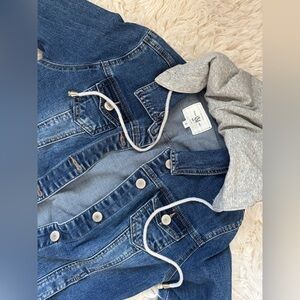 Jean jacket size Small comes with attachable grey hoodie. good condition!